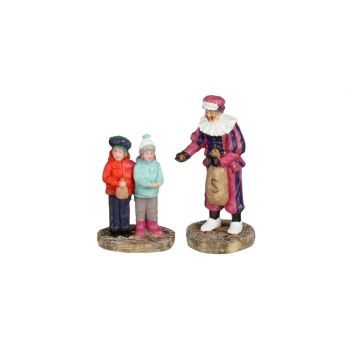 Luville Molendam Piet geeft pepernoten
